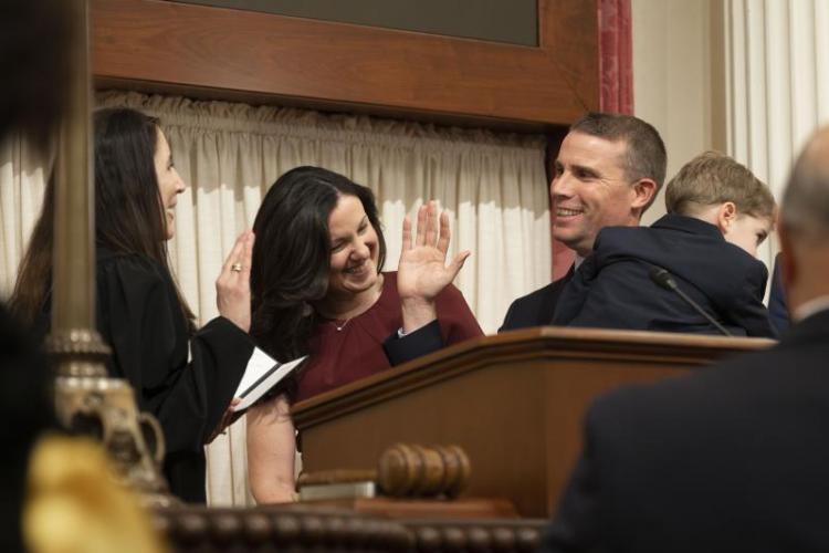 Senator Mike McGuire is accompanied by his family as he is sworn in as California Senate President pro Tempore.