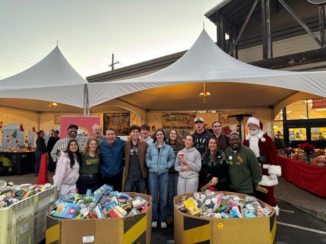 Sen. McGuire and local high school students at the Humboldt Holiday Food Drive 